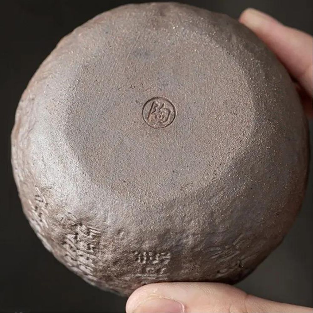 Tasse à thé chinoise en poterie gravure